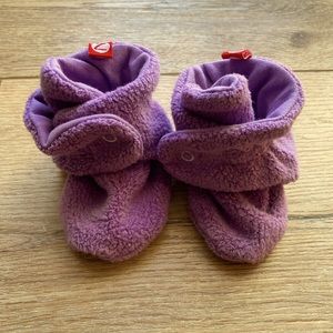 Purple Zutano fleece booties